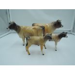 Four Beswick studies, Jersey family, Bull 1422, Cow 1345 & Calf 1249D x2