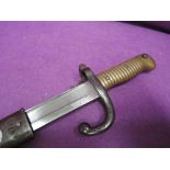 A French Chassepot rifle sword bayonet, 1866 with metal scabbard