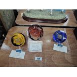 Three Caithness Limited Edition Paperweights, Sword Dance 565/750, Cataclysm 439/750 and Gravitation