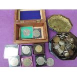 A collection of GB and World coins in two boxes