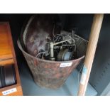 A selection of fishing tackle with rustic bait bucket