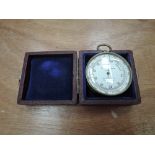 A pocket compensated barometer by W G Whiting Ltd, Manchester, in case
