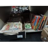 A shelf of 1980's and later comics and annuals including Dandy, Beano, Topper etc