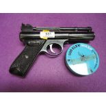 A Webley Mark 1 .22 air pistol with a tin of pellets