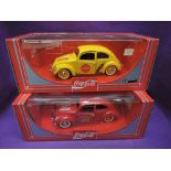 Two Hartoy Solido Coca-Cola 1:18 scale diecast Beetle advertising cars, both in window display