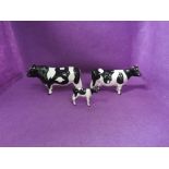 Three Beswick studies, Friesian Bull (af), Cow 1362A and Calf 1249C