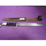 A German bayonet by F W Holler Solingen with leather scabbard