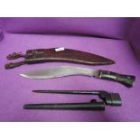 A bayonet with metal scabbard for the No4 Rifle, No4 March 11, C1940, plus a Kukri knife with