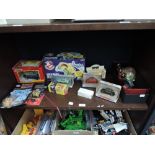 A shelf of mixed diecasts including Corgi 007 Citroen 2CV, Kenner Highway Haunter and three Dinky