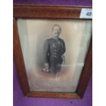 A signed photograph of Kaiser Wilhelllm II dated 3 XII 1907 by E Bieder Hamburgh, oak frame