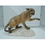 A Beswick study, Puma On Rock, style one, tan, matt 1702