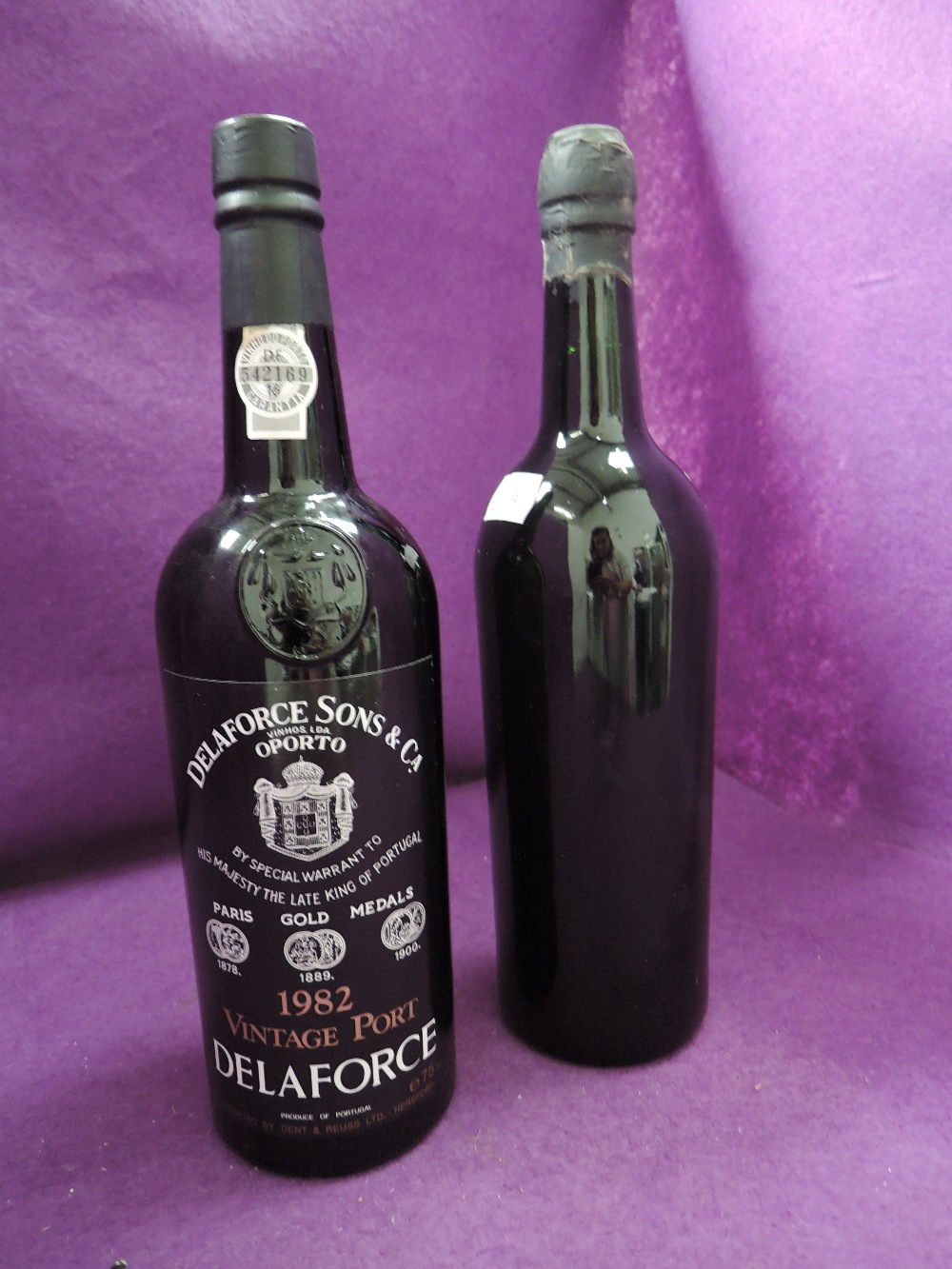 Two bottles of Port, Warre 1966, no label, Delaforce Sons & Co 1982