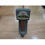 A tavern advertising beer or similar pump labelled Smooth Joseph Holt draft