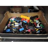 A box of mixed playworn diecasts including Corgi, Matchbox, Burago etc