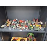 A shelf of mixed playworn diecasts including Dinky Military, Corgi Popey, Tom & Jerry, Roadrunner,