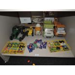 A shelf of playword diecast and pressed steel vehicles including Corgi, Matchbox, Tonka etc