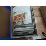 A box of used and mint stamps plus covers