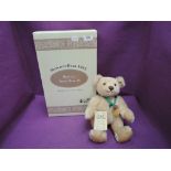 A modern Steiff Bear, Hercule Teddy Bear 28, 1995 having white tag 999079 with gold button,