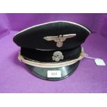 A German World War II private purchase officer's Allgemeine cap with white piping and badges
