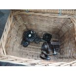A wicker fishing basket and tackle