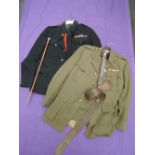 Two British military uniforms, one black with red stripe, one khaki, 5AM brown belt and swaggar