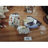 Three Royal Crown Derby Paperweights, Squirrel, Rabbit and Duck, all having gold stoppers