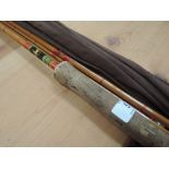 An Alcock popular 3 piece split cane fishing rod