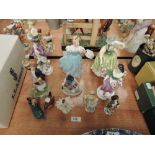 Two Royal Doulton figurines, Buttercup HN2309 & Enchantment HN2178 along with nine Capo Di Monte and