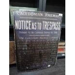 An Enamel sign, Caledonian Railway Notice As To Trespass, purple ground with white lettering
