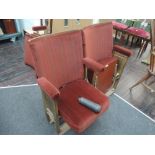 A set of two art deco cinema seats cast iron bases tilt top seats with period style upholstery