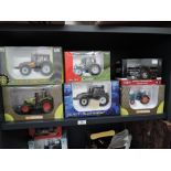 Six Universal Hobbies 1:32 scale diecast tractors, Valtra C Series Cow decoration, Valtra T Black