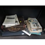 A vintage small travel case containing various motorcycling ephemera including Motor Cycling First