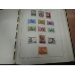 A collection of mint and used stamps of Hungary, in four Davo Magyar albums 1871-1980's
