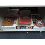 A shelf of vintage games including DownFall, Hands Down, P&M, Sorry etc