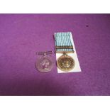 A British Korea medal, unnamed and a United Nations Korea medal