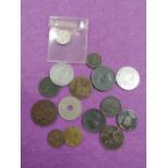 A small collection of UK coins including 1859 penny, 1822 Irish halfpenny