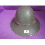 A British Army WW2 helmet 1941 size 6 3/4 C.C.Y.S Ltd Cap Badge and a WW1 Victory Medal to 133434