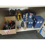 A shelf of BBC Worldwide and similar Doctor Who figures and accessories including Battles in Time