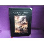 A leather bound hardback volume, The Horus Heresy, Book Two, Massacre, by Alan Bligh, A Supplement