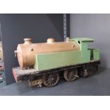 A live steam scratch built 0 gauge 0-4-0 locomotive, having brass body