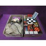 Two small boxes of vintage childrens puzzles including Rubik's Cubes, Magic Snake and Lumar YoYo