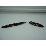 A Sheaffer Balance fountain pen, 1930, Ebonized peal pattern, medium nib, lever fill, vary good