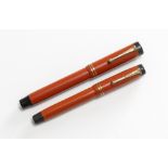 Two Parker fountain pens. A Parker Duofold Lucky Curve Snr (personalised), a Parker Duofold