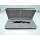 A boxed Delta Alfa Romeo fountain pen, Black resin with Platinum trim, medium nib, cartridge, made