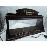 An illuminated advertising display for Parker Duofold fountain pens "the pen that loves its work"