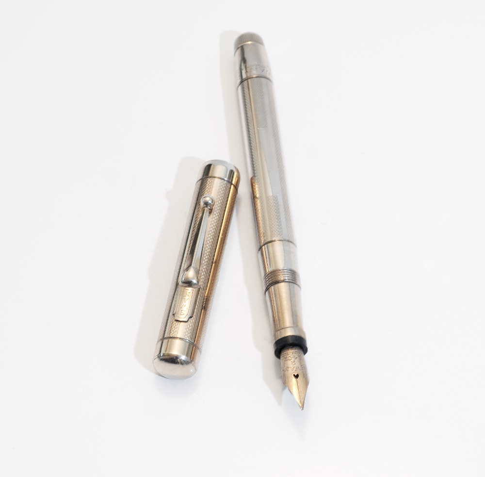 A Mabie Todd Swan fountain pen. A Mabie Todd Swan leverless fountain pen with rolled gold overlay ( - Image 2 of 2