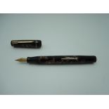 A Croxley Dickenson fountain pen circa 1950, in Pink and Black marble, medium nib, lever fill,