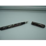 A Silver Grey and Red marble fountain pen maker unknown, circa 1930, medium Welsharp nib, lever