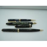 A Parker Fountain pen and propelling pencil and Waterman propelling pencil. A Parker Vacumatic