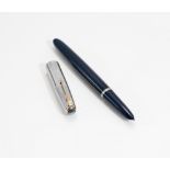 A Parker fountain pen. A Parker 51 Blue Diamond Vacumatic in black with stirling silver cap. Cap